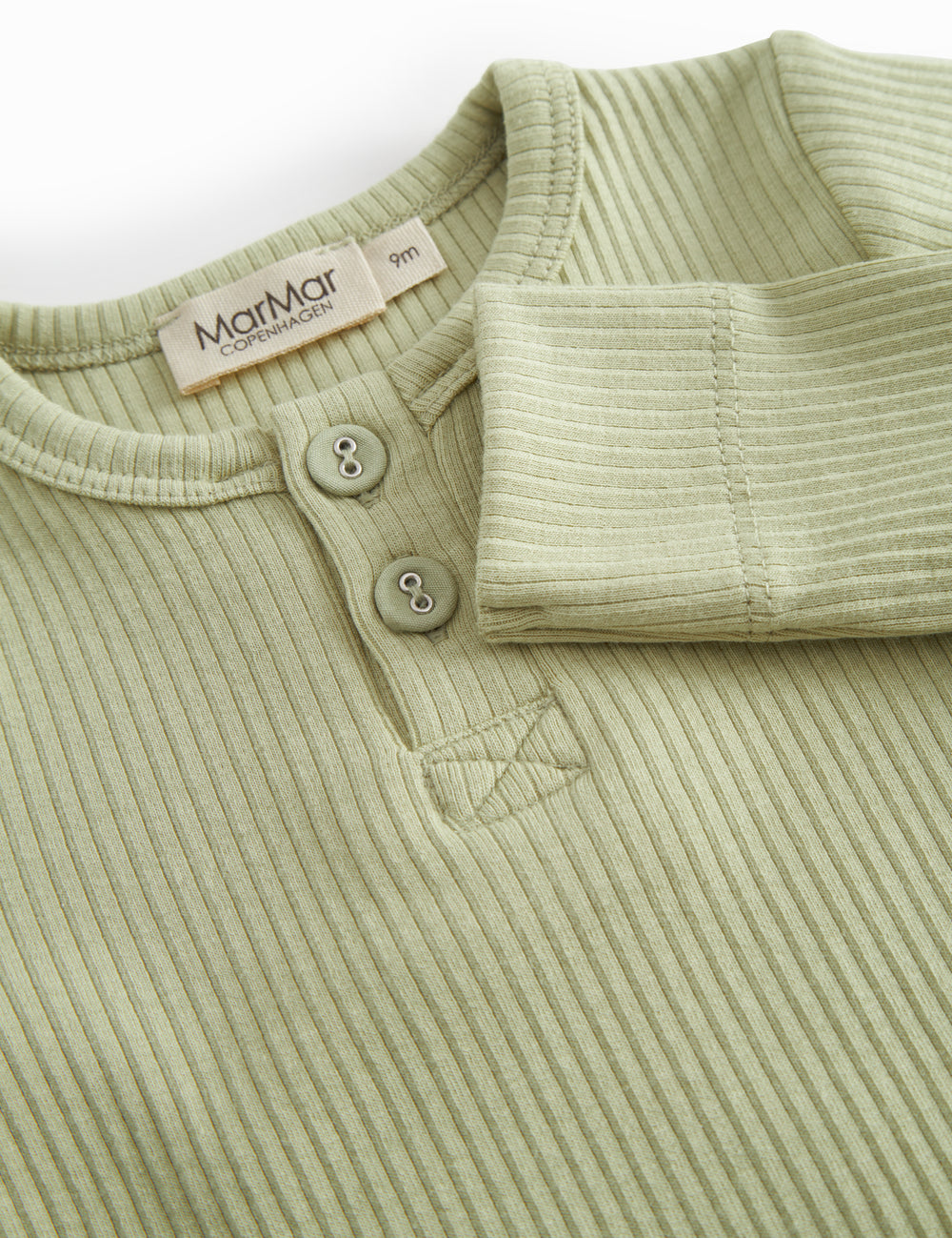 Green baby pants in ribbed modal.