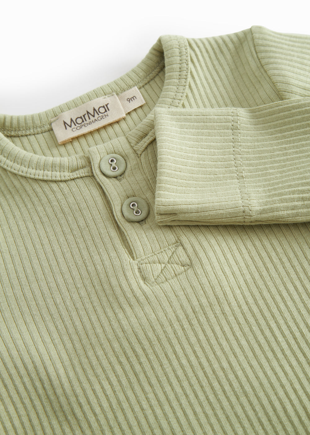 Green baby pants in ribbed modal.