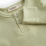 Green baby pants in ribbed modal.