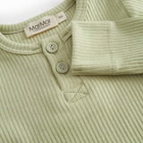 Green baby pants in ribbed modal.