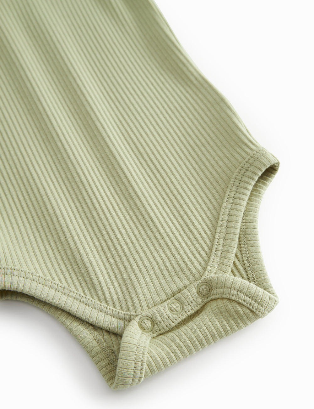 Green baby pants in ribbed modal.