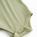 Green baby pants in ribbed modal.