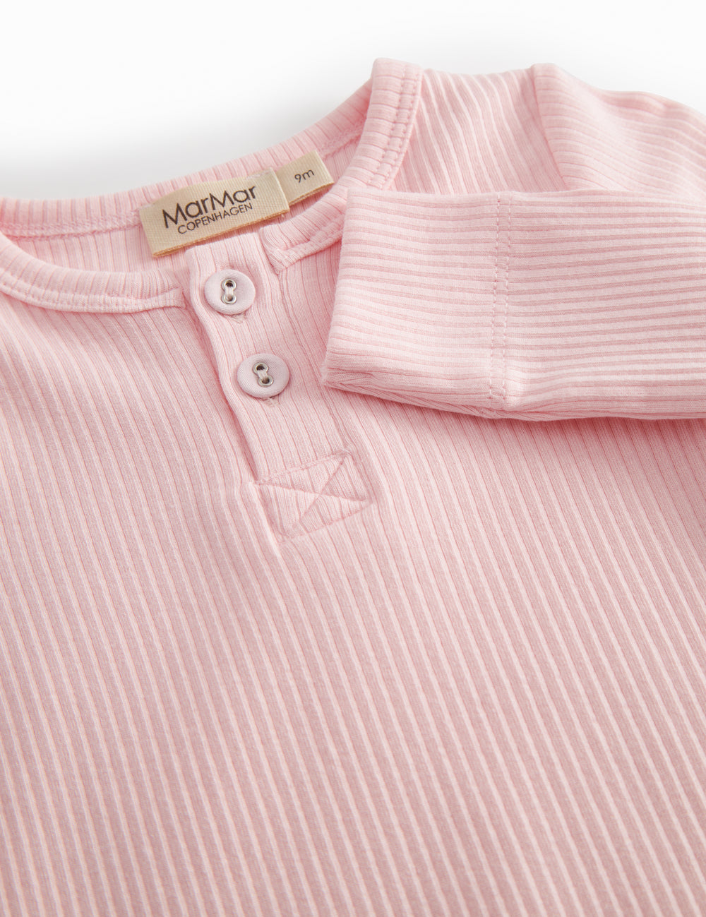 Lyserød langærmet baby bodystocking med stolpe knaplukning