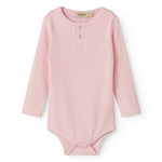 Red long-sleeved baby bodystocking with snap closure.