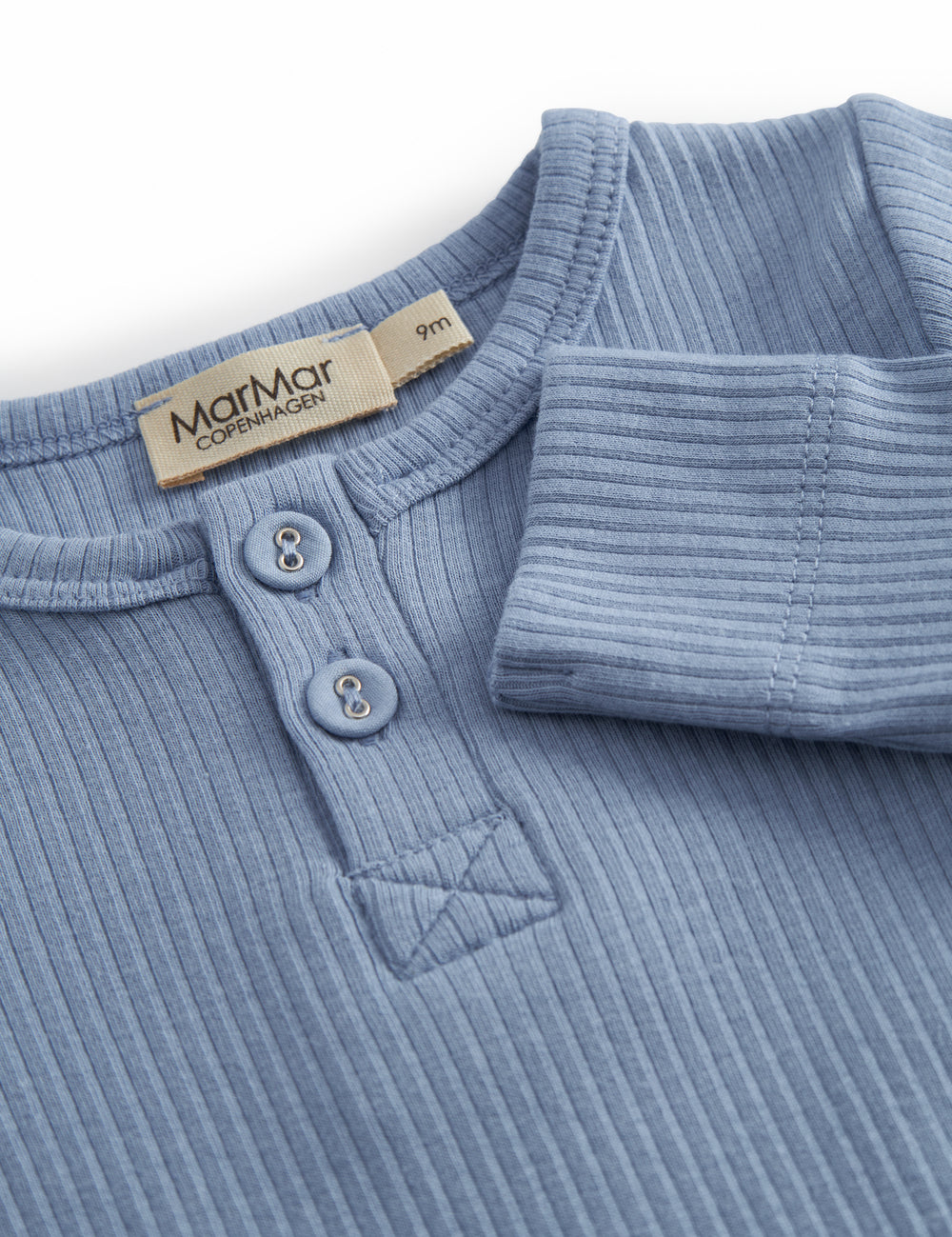 Light blue long-sleeved baby bodystocking with snap closure