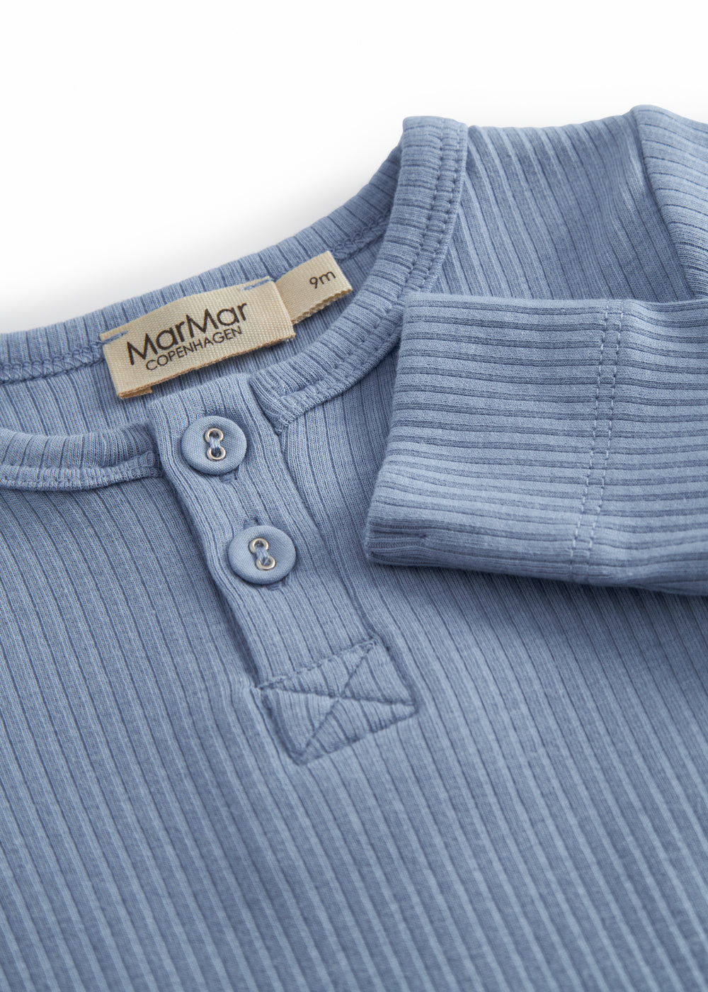 Light blue long-sleeved baby bodystocking with snap closure