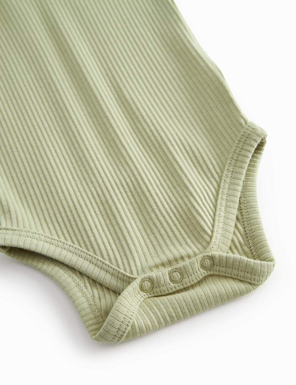 Red short-sleeved baby bodystocking with garter snap closure.