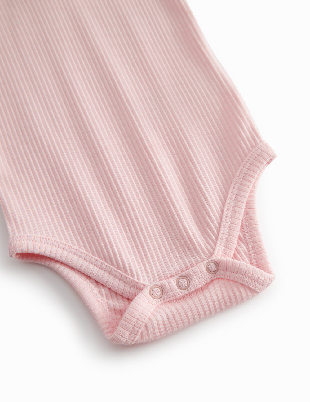 Red short-sleeved baby bodystocking with garter snap closure.