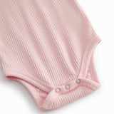 Red short-sleeved baby bodystocking with garter snap closure.