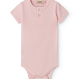 Red short-sleeved baby bodystocking with garter snap closure.