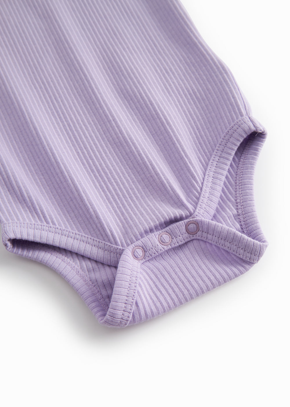 Lilla ribstrikket baby bodystocking uden ærmer