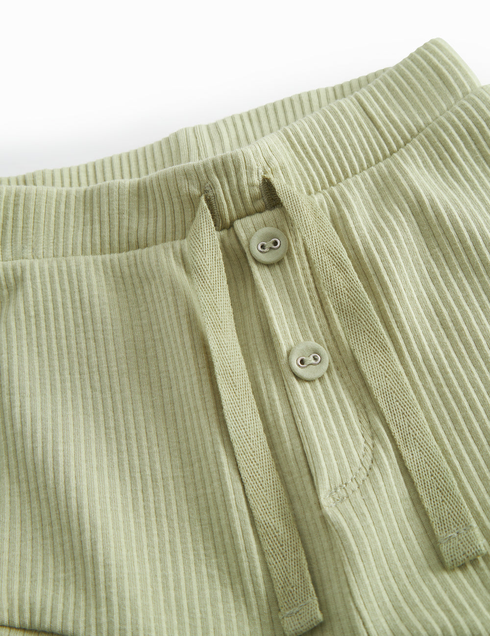 Green baby bloomers with snap closure