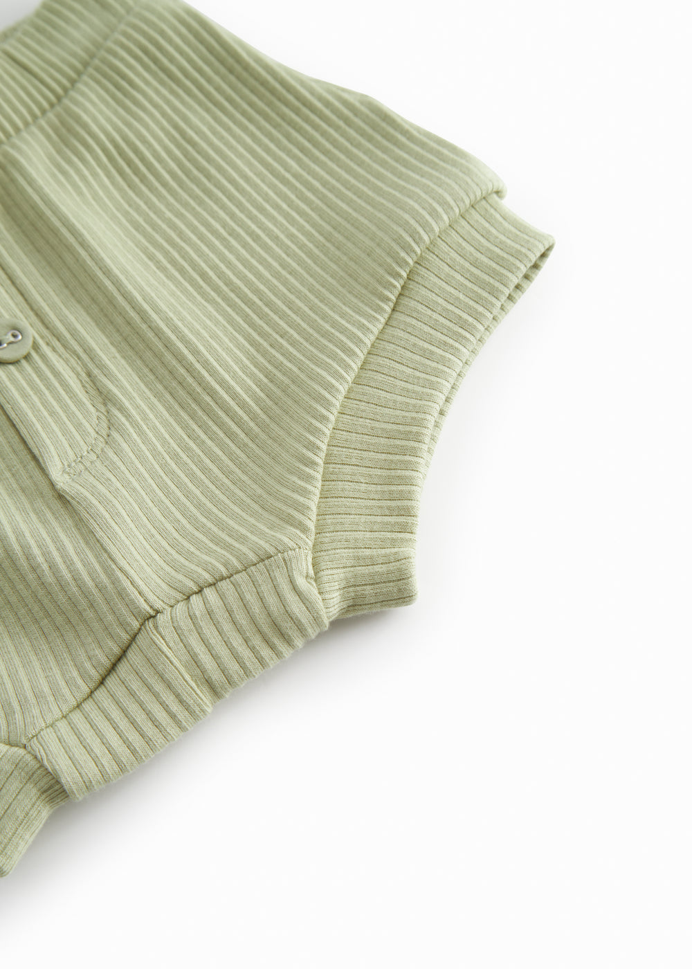 Green baby bloomers with snap closure