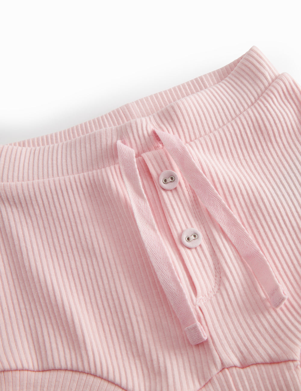 Lyserøde baby bloomers med stolpe knaplukning