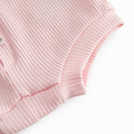 Lavender baby bloomers with snap closure.