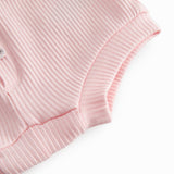 Lavender baby bloomers with snap closure.