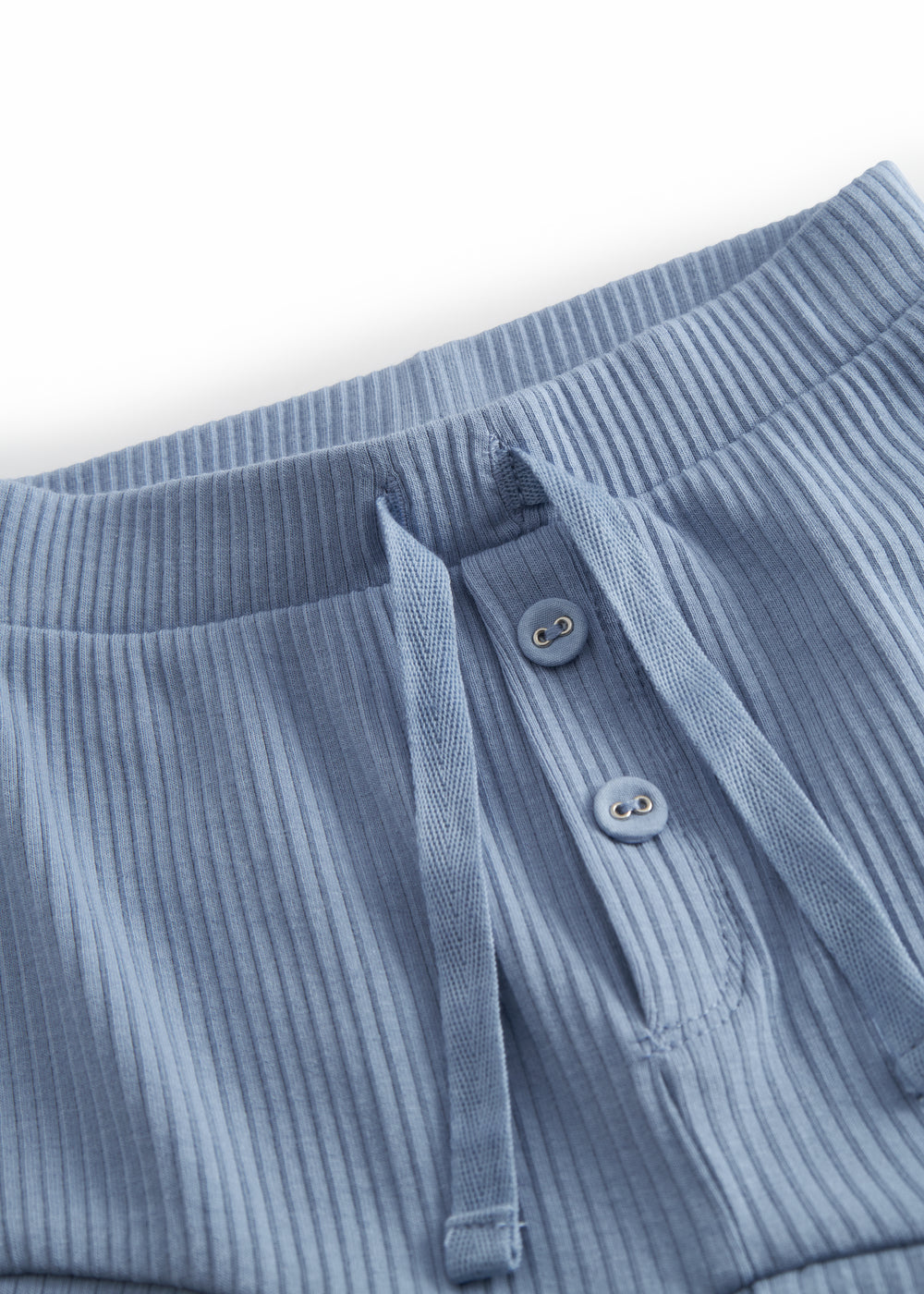 Light blue baby bloomers with button fly closure