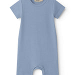 Short-sleeved baby modal romper with short legs in a light blue shade.