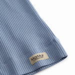 Undertrøje uden ærmer i lyseblå ribstrikket modal til børn 