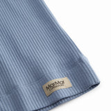 Undertrøje uden ærmer i lyseblå ribstrikket modal til børn 