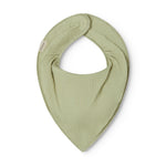 Green baby salve jars with a push button.