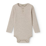 Beige baby pants with elastic and a decorative band at the waist.