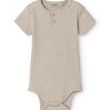 Short-sleeved baby modal bodystocking with snap closure.