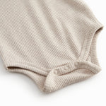 Beige long-sleeved modal baby bodystocking