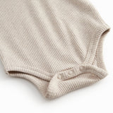 Beige long-sleeved modal baby bodystocking