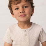 children wearing a beige ribbed t-shirt with buttons