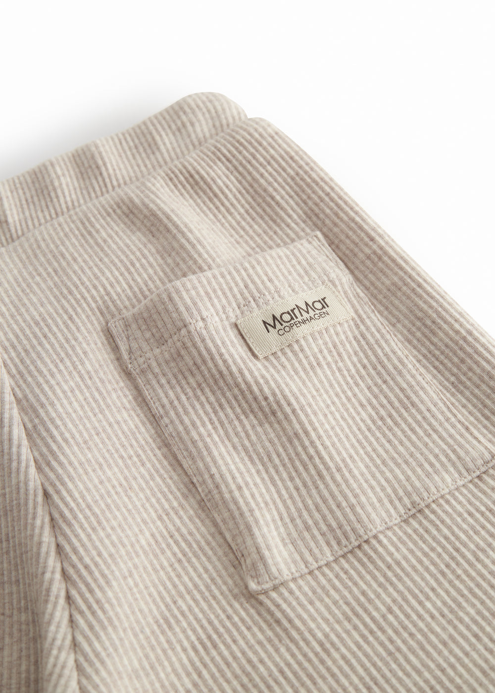 Beige Baby modal shorts with wide elastic and drawstring at the waist.