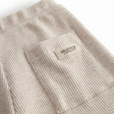 Beige Baby modal shorts with wide elastic and drawstring at the waist.