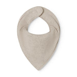 Beige baby salves that close with a button.