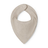 Beige baby salves that close with a button.