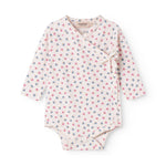 Langærmet bodystocking for a newborn baby with snap closure and flowers.