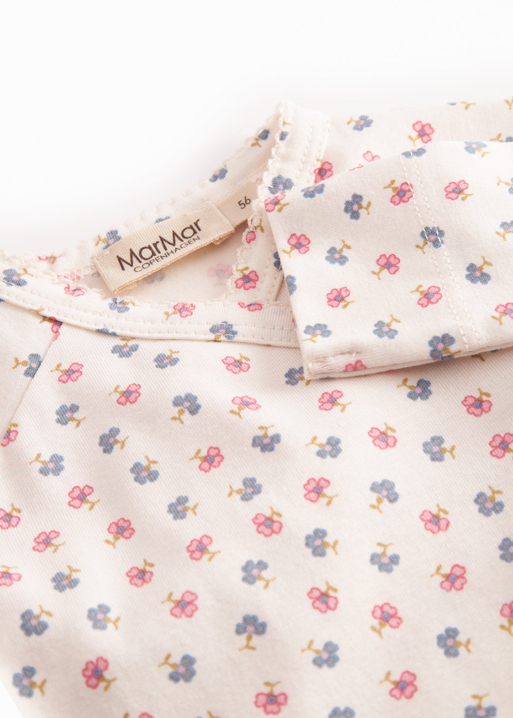 Fitted blouse for newborn baby with snap closure and floral print