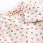Fitted blouse for newborn baby with snap closure and floral print