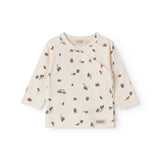 Fitted blouse for newborn baby with snap closure and train print.