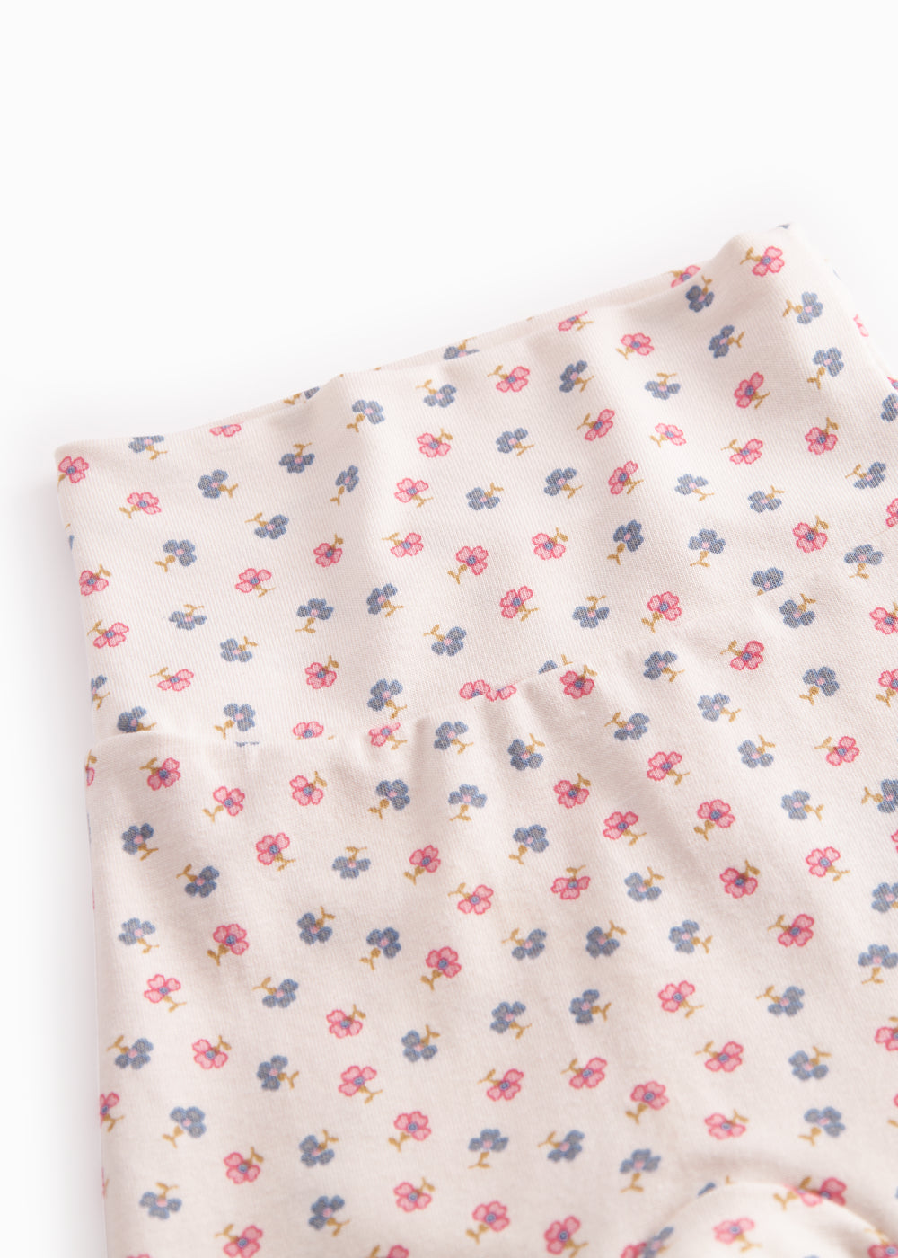Baby pants with feet and flower print for the newborns