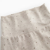 Beige baby pants with feet for newborns with a sweet print