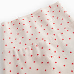 Diapers with feet for newborns with a sweet heart print