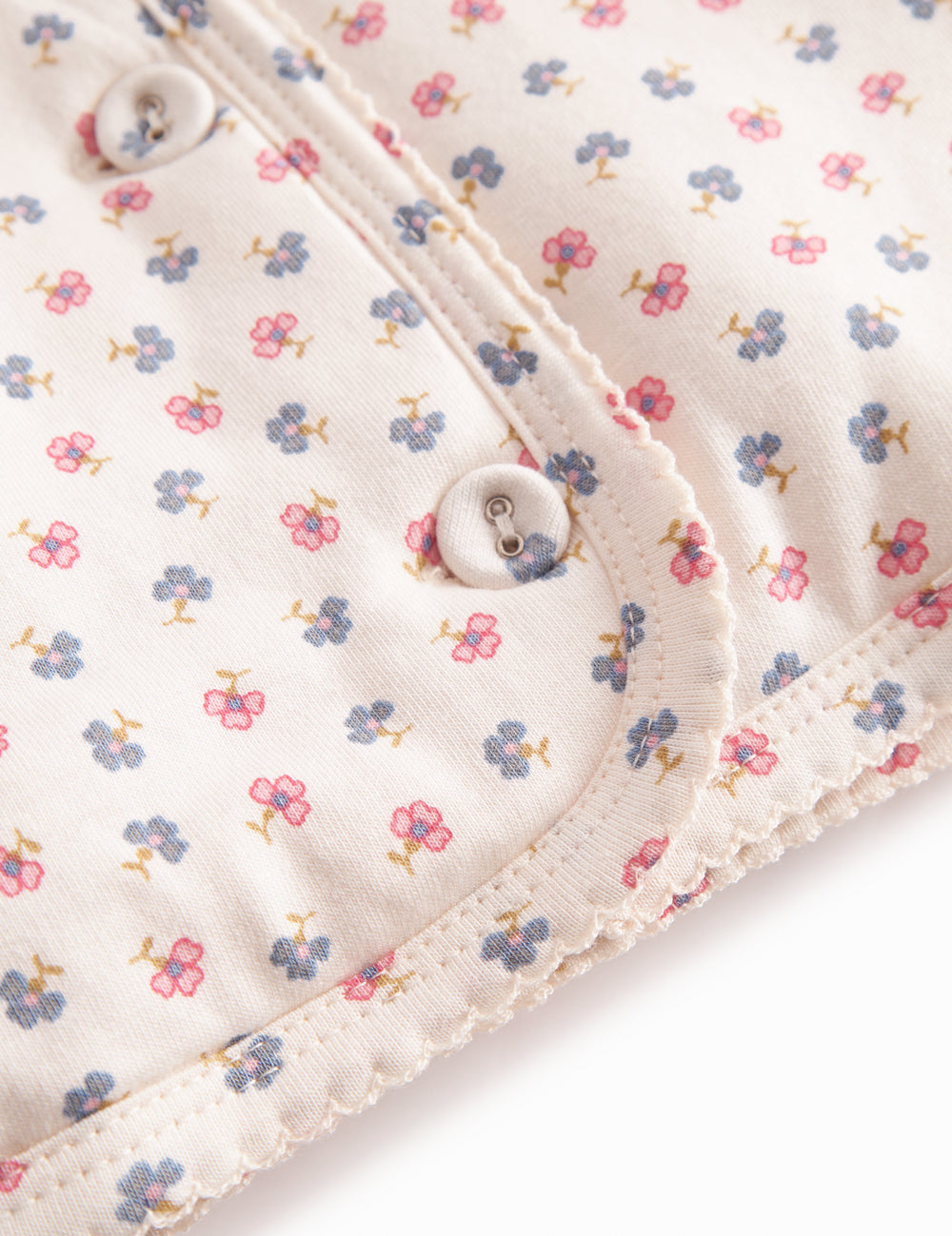 The jacket for newborn and baby with hat, snap closure, and flower pattern.