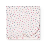 Baby blanket with rounded corners, picot edges, and floral print.