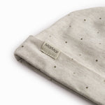 Beige baby hue for newborn with edge, knot, and a sweet print