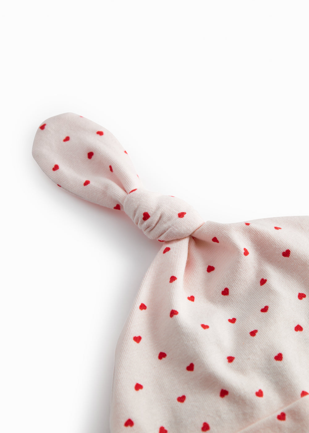 Baby blue with newborn edge, knot, and a sweet heart print