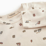 Warm baby bodystocking with a dog print