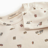 Warm baby bodystocking with a dog print