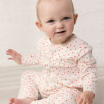 baby worn with a sweet heart print and button closure the entire way way