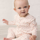 baby worn with a sweet heart print and button closure the entire way way