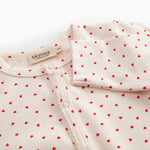 Baby carried with a sweet heart print and button closure the entire way way way